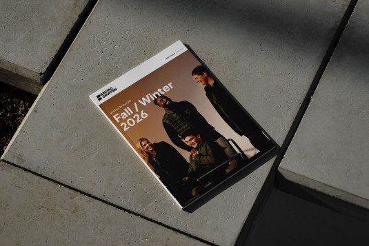 An physical product catalogue of Båstadgruppen products on a concrete tile floor