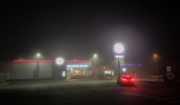 A fast food diner in the fog