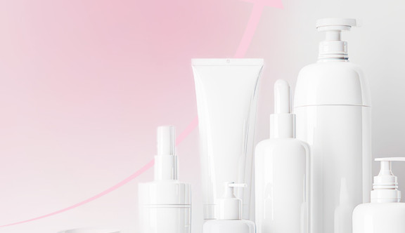 Collection of generic cosmetics bottles against a gradient pink-white background